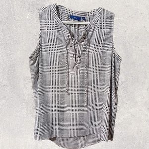 Black and white plaid sleeveless shirt. Size Large